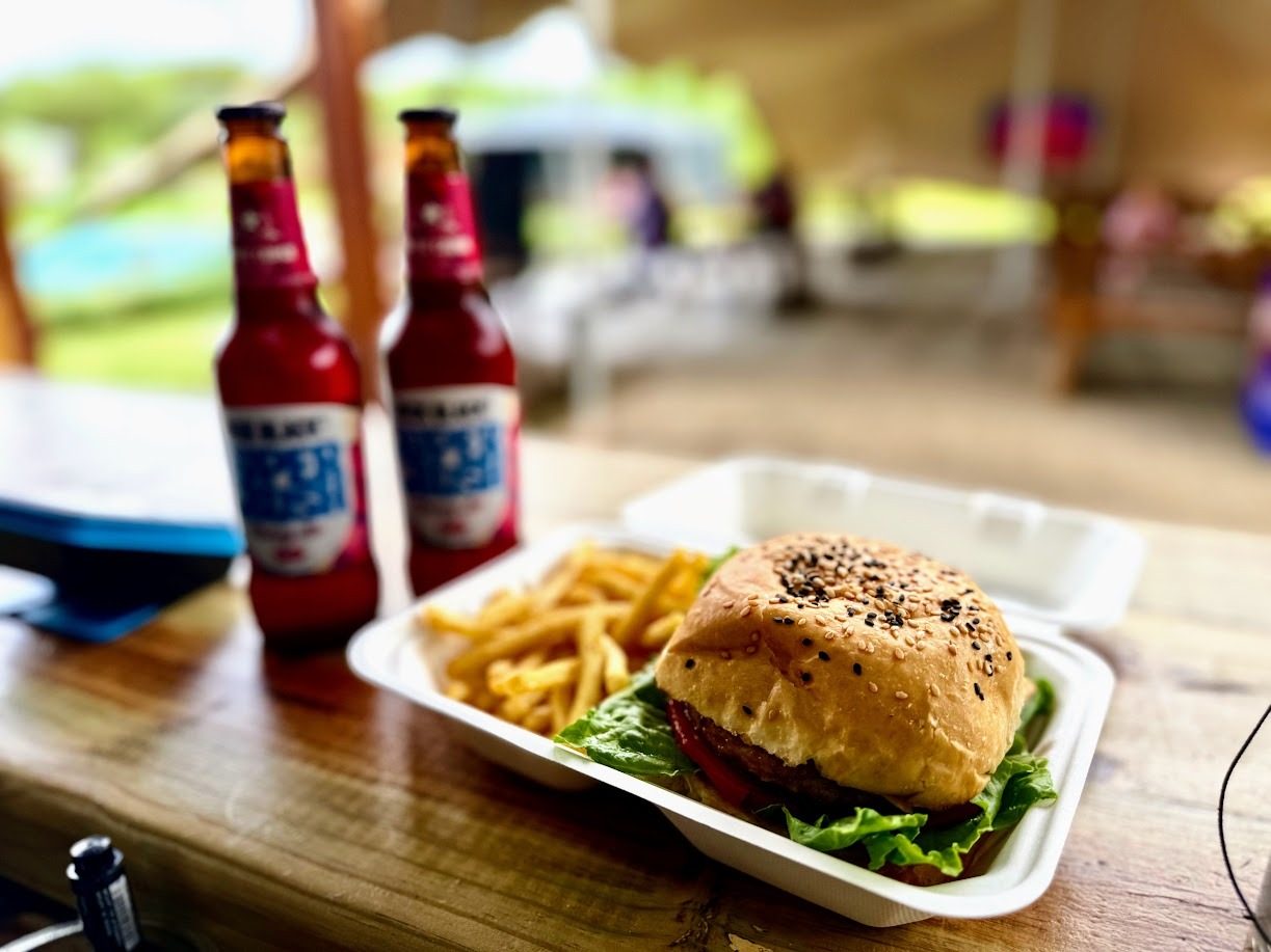 Beef burger and fries with drinks at Yellow's Bru