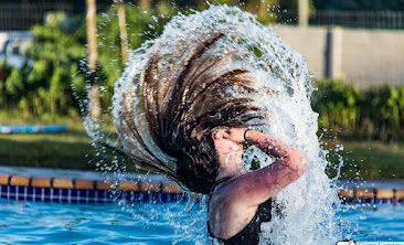 A guest surfacing in the award-winning pool at Yellow Sands